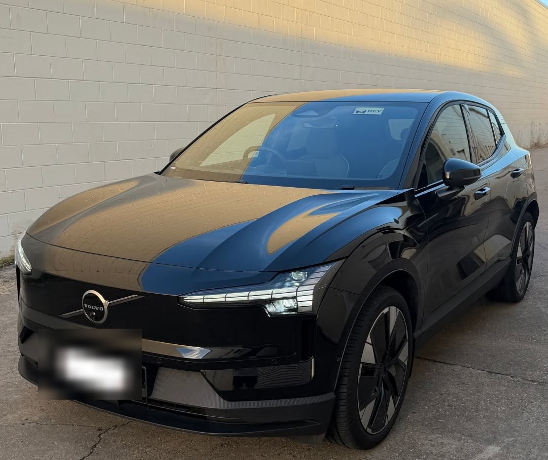 Black SUV polished to a mirror finish